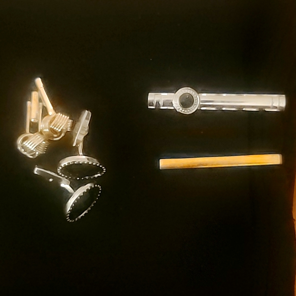 Bundle of tie clips and cuff links